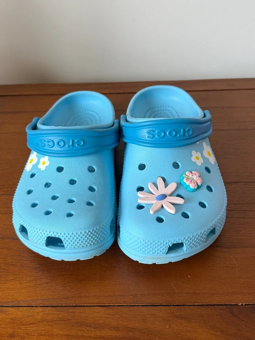 CROCS Kids Light Blue Clogs with Flower Jibbitz